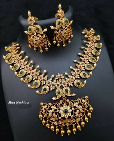 1.   Gold plated matt finish necklace. 2.   Good to wear at any party and on any attire. Festive Antique Gold Temple Jewelry Bridal Necklace, Antique Gold Chandbali Temple Necklace, Gold Kundan Temple Jewelry Necklace, Ornate Gold Temple Necklace For Puja, Antique Gold Chandbali Temple Necklace With Intricate Design, Antique Gold Heavy Temple Necklace, Traditional Gold Temple Necklace With Peacock Design, Gold Bridal Necklace With Peacock Design For Rituals, Heavy Antique Gold Temple Necklace