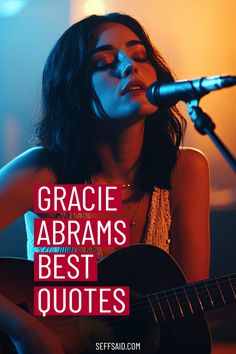 a woman singing into a microphone while holding a guitar in front of her and the words grace abrams best quotes