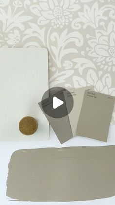 the paint colors are being used to create this wallpaper design with white and gray damask