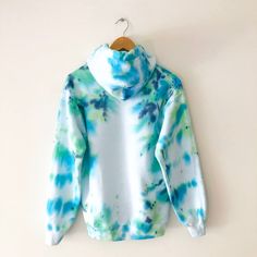 One of a kind, hand-dyed blue and green tie dye hoodie sweatshirt Unisex size S Care instructions: Wash separately in cold water. Colors may change over time. Please note that this is a hand-dyed garment and there may be small imperfections. Blue Washed Hoodie Sweatshirt, Blue Washed Hoodie With Relaxed Fit, Blue Washed Relaxed Fit Hoodie, Blue Washed Cotton Hoodie, Blue Washed Hooded Hoodie, Blue Washed Hoodie, Tie Dye Hand Dyed Hoodie Sweatshirt, Tie Dye Washed Long Sleeve Hoodie, Hand Dyed Blue Long Sleeve Sweatshirt