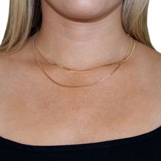 Penelope is a double layered herringbone and box chain necklace. This beautiful necklace will be your new go-to for every day at home, work, or special events. Wear it alone for a minimal look or style it with longer necklace layers. Product Features: Material: 18K gold plated alloy Length: Chains measure 14.5", 16" and can be adjusted an extra 2.5" for 18.5" total length Two layer necklace Lobster claw clasp Dainty Layered Snake Chain Necklace, Double Snake Chain Necklace For Layering, Double Chain Snake Necklace For Layering, Snake Chain Necklace With Double Chain For Layering, Minimalist Layered Necklace With Clavicle Chain, Delicate Chain Herringbone Necklace For Layering, Elegant Double Chain Snake Necklace For Layering, Dainty Layered Necklace With Snake Chain, Minimalist Double Chain Herringbone Necklace