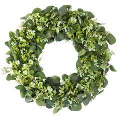 a wreath with green leaves and white flowers