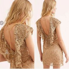 Stunning Little Gold Shimmery Dress, Can Be Dressed Up For Any Event. Beautiful Detail With A Gold Lace And Gold Sequins Over A Nude Shift. A Frill Lines The V-Neck Front To Back So Can Be Worn On Or Off The Shoulders. Tassel Ties At The Back With Brass Bells; Adjustable Ties, Ensures It Doesn't Slip Off. Ruching On The Sides Makes It A Flattering Fit. Invisible Side Seam; Hidden Zip Closure. This Is A Fitted Dress In The Waist And Skirt. Crossover Hem In Front. *Hand Wash Cold / Dry Clean *Full Gold Party Dress With Lace Trim, Gold Dress With Lace Trim, Gold Lace Dress With Lace Trim, Gold V-neck Mini Dress For Formal Occasions, Gold V-neck Mini Dress For Cocktail, Gold Bohemian V-neck Dress, Evening V-neck Mini Dress With Lace Trim, Bohemian V-neck Embellished Mini Dress, Shift Mini Dress