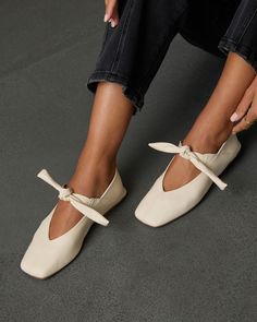 Step into romance with the Take My Hand Knotted Ballet Flats. Crafted from smooth faux leather, these beauties exude effortless French charm with the dainty knotted detail at the vamp that adds a touch of feminine flair, making them the perfect pairing for both casual dates and chic outings. Whether you’re strolling through autumn streets or enjoying a cozy café moment, these flats offer a blend of sophistication and comfort that will have you falling in love all season long. Smooth faux leather Adjustable knot tie accent at vamp Square toe Runs small, consider sizing up Material: Faux leather Take My Hand, Knot Tie, Adjustable Knot, Sleeveless Cardigan, Swimwear Bottoms, Casual Date, Shopping Day, Wrap Sweater, The Vamps