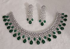 CZ Diamonds Silver Emerald Necklace Earrings Set, Bridal Necklace Earrings Antique Jewelry Set Statement Choker Necklace Earrings Engagement Adorn yourself with this beautiful CZ Diamonds Necklace Earrings Set ITEM DESCRIPTION Metal        = Silver Plated Occasion  = Wedding ,Party Wear, Bridal Color        = White and  Green Size          = Necklace Length = 7 Inches Long, Earring Size = 2 Inches Long,  Free Shipping Jewelry Brand Logo, Jewelery Organizer, Jewelry Packaging Design, Wood Jewelery, Jewelry Box Diy, Long Earring, Wedding Party Wear, Diamonds Necklace, Bridal Diamond Jewellery