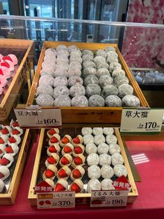 many different types of pastries are on display