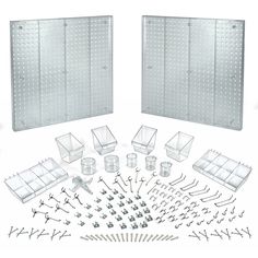 the contents of a plastic model kit including parts and tools for making an assembly machine