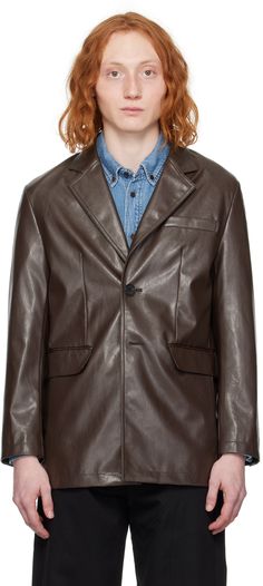 Grained faux-leather blazer. · Notched lapel · Button closure · Welt pocket at chest · Flap pockets · Padded shoulders · Four-button surgeon's cuffs · Central vent at back hem · Welt pocket at interior · Full satin lining Supplier color: Brown Tailored Leather Blazer With Pockets, Leather Notch Lapel Blazer With Pockets, Leather Blazer With Notch Lapel And Pockets, Tailored Leather Jacket With Pockets For Formal Events, Tailored Leather Jacket With Pockets For Formal Occasions, Leather Blazer With Pockets For Work, Leather Blazer With Pockets For Formal Occasions, Formal Leather Jacket With Lapel Collar And Pockets, Business Leather Blazer With Pockets