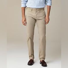 Our World-Famous Stretch Chinos (Aka Khakis) Are Customer Favorites For A... - Reasonseveral, Actually. Our Designers Engineer These Pants With Precisionusing Fit And Fabric Detail That'll Make You Want To Wear Them Every Day. We Use Just The Right Amount Of Stretch On Demand For Extra Flex You'll Only Notice When You Need It. Custom Striped Yarn-Dyed Pocket Bags And An Old-School Coin Pocket At The Right Hip Are Functional Touches That Just Look Great Too. Our Designers Painstakingly Calibrate Beige Slim Fit Straight Leg Bottoms, Slim Fit Mid-rise Classic Chinos, Business Casual Slim Fit Straight Bottoms, Straight Slim Fit Bottoms For Business Casual, Mid-rise Cotton Dress Pants For Business Casual, Beige Slim Fit Straight Leg Chinos, Fitted Cotton Dress Pants With Straight Shape, Casual Fitted Straight Dress Pants, Fitted Cotton Dress Pants Straight