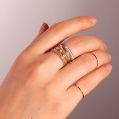 A shiny and shimmering coin-edged ring to wear on its own, or to add to a stack. Throw a coin in the metaphorical fountain! Stacked Yellow Gold Round Jewelry, Stacked Round Yellow Gold Jewelry, Fine Jewelry Stackable Gemstone Rings, Fine Jewelry Stackable Initial Open Ring, Stackable Open Ring Initial In Fine Jewelry, Fine Jewelry Stackable Initial Ring With Round Band, Stackable Initial Ring With Round Band In Fine Jewelry, Gold Minimalist Stackable Engraved Ring, Minimalist Gold Engraved Stackable Ring