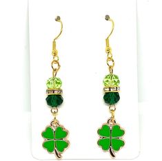 Get ready to celebrate St. Patrick's Day in style with our charming Shamrock Dangle Earrings! Crafted with exquisite attention to detail, these earrings feature delicate shamrock-shaped charms dangling gracefully from hypoallergenic hooks. Whether you're attending a festive parade or enjoying a night out with friends, these earrings are the perfect accessory to add a touch of whimsy and luck to your ensemble. These earrings include a metal alloy open shamrock or a green enamel filled shamrock pa Shamrock Earrings, Luck Of The Irish, Green Enamel, Green Crystals, Heart Jewelry, Spacer Beads, Handcrafted Jewelry, Light In The Dark, Gold Earrings