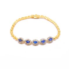 Blue Sapphire Silver Bracelet - Pave Diamond Solitaire Bracelet - 18k Gold Plated Handmade - Elegant & Beautiful Jewelry Description: Discover the beauty and sophistication of our Blue Sapphire Silver Bracelet, a stunning piece that exudes elegance and charm. Perfect for adding a touch of luxury to any outfit or for gifting to someone special, this handmade bracelet features: Materials: Sterling Silver Base with 18k Gold Finish Bracelet Length : 7.5 inch Stones: Pave Diamonds & Blue Sapphire Des Elegant Blue Bangle Charm Bracelet, Elegant Blue Bangle Gold Bracelet, Blue Oval Bracelet As A Gift, Blue Oval Bracelet As Gift, Elegant Blue Gold-plated Bracelets, Formal Sapphire Bracelet, Luxury Blue Gold Jubilee Bracelet, Gold Oval Tennis Bracelet As Gift, Oval Sapphire Bracelets As Gift