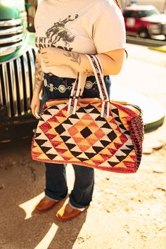 Our Orange Burst Aztec Duffel Bag makes traveling easy! This bag features a stunning bright colored Aztec pattern so you can take on vacation in style. Pack it full of your favorite Wild Junkie items and get ready for a weekend getaway! 19" x 9" x 11" Fringe Crop Top, Jeans Shirt, Viking Warrior, Aztec Pattern, Bright Colored, Orange Bag, Weekend Getaway, Duffel Bag, On Vacation