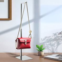 【5 X 5 X 27" L-Shaped Purse Display】 This handbag display rack is made of stainless steel with a polished finish. The L-shaped hook fits any handbag handle without scratching the leather surface, keeping the handbag securely in place without falling off easily. The EVA base ensures stability and prevents slipping, ensuring safe use.【15-27" Adjustable Height】 The base dimensions of this handbag display rack are 5.91 X 5.12 inches (15CM X 13CM) with a thickness of 0.25mm. The height can be adjuste Displaying Purses, Purse Display, Handbag Display, Handbag Holder, Accessories Elegant, Handbag Boutique, Hat Display, Storage Closet Organization, Handbag Handles