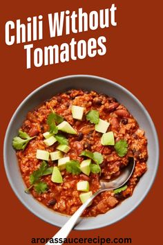 chili without tomatoes with avocado in a bowl and the title overlay reads chilli without tomatoes