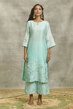 Ice blue kurta featuring floral cutwork and dori embroidery, paired with flared palazzo and an organza scalloped dupatta. The palazzo includes an elasticated waistband and attached lining., Fit: Relaxed Scalloped Dupatta, Floral Cutwork, V Neck Kurta, Kurta Set With Dupatta, Kurta And Palazzo, Embroidery Suits Punjabi, Kurta Palazzo Set, Flared Palazzo, Chanderi Dupatta