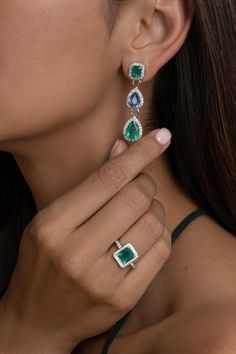 Luxury Fine Jewelry With Emerald, Green Platinum Jewelry With Halo Design, Green Sapphire Jewelry With Halo Setting, Blue Emerald Gemstone Earrings, Gia Certified Green Sapphire Jewelry, Luxury Traditional Emerald Earrings, Luxury Blue Emerald Earrings, Luxury Green Sapphire Jewelry, Luxury Faceted Emerald Jewelry