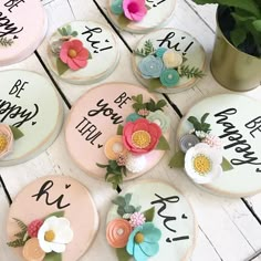 several decorated cakes sitting on top of a table