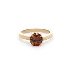 Whiskey: Cognac Diamond Solitaire Ring Lingering with smoky, malty flavour...The dark, amber colour of this cognac diamond is the reminiscent of a fine, barrell-aged whiskey. Featuring a 1.02 ct brilliant cut cognac diamond, the 18ct yellow gold perfectly complement this stunning coloured diamond. This particular piece is currently in stock and can be ready to ship within 1-3 days, after resizing to suit your ring size if necessary. If you would like this style custom crafted to your specificati Classic Brown Rings With Polished Finish, Luxury Brown Formal Rings, Formal Brown Rings With Polished Finish, Elegant Brown Diamond Ring For Formal Occasions, Modern Brown Jewelry For Anniversary, Brown Round Diamond Ring In Fine Jewelry Style, Brown Diamond Ring In Fine Jewelry Style, Modern Brown Rings For Anniversary, Modern Brown Ring For Formal Occasions