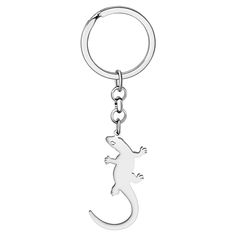 a keychain with a lizard on it's side and a chain hanging from the