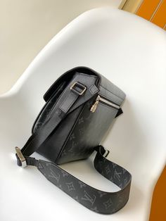 New Messenger bag is newly unveiled in the Taigarama series. It is made of soft Taiga leather and canvas to create ample space. Open the spring buckle to reveal the spacious front pocket and double inner pockets, making it a smart companion for urban life. Size: 29.0 x 23.0 x 11.5 cm (LxHxW) Coated canvas and calfskin Coated canvas and calfskin trim Textile lining metallic parts Front pocket under buckle Dual inner pockets Back zip pocket Shoulder strap: non-detachable, adjustable Strap half len Designer Backpack Shoulder Bag For Daily Use, Designer Backpack Satchel For Daily Use, Designer Satchel Backpack For Daily Use, Designer Shoulder Bag Backpack For Daily Use, Designer Daily Use Shoulder Bag Backpack, Designer Shoulder Backpack For Daily Use, Designer Coated Canvas Backpack Style Shoulder Bag, Designer Coated Canvas Shoulder Bag Backpack, Designer Coated Canvas Backpack Shoulder Bag