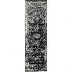 a black and white rug on a white background