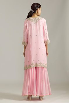 Pink kurta featuring silver floral embroidery with cutdana and scalloped borders. Paired with a matching sharara and dupatta, all in net and georgette fabric., Fit: Relaxed Kurta Sharara Set, Pink Kurta, Kurta Sharara, Embroidered Motifs, Sharara Set, Women Kurta, Straight Kurta, Georgette Fabric, Pink Sequin