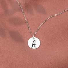 The Custom Initial Disc Necklace is the perfect way to show off your unique style and personality. This beautiful, personalized necklace offers you the opportunity to create something absolutely unique and meaningful! Choose from one to six discs crafted from our three different metal choices: silver, gold, and rose gold. Each disc can be custom engraved with an initial of your choice, or select any symbol from our curated list. The necklace also comes in three different lengths so you can find Initial Disc Necklace, Custom Initials, Create Something, Disc Necklace, Personalized Necklace, Custom Engraving, Unique Style, Gold Filled, Silver Gold