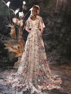 Embrace your inner flower child with the Myra Floral Embroidered Gown! This A-line dress has stunning vintage vibes and is perfect for any special occasion. Made with high-quality tulle and exquisite embroidery, this floor-length design is both beautiful and fashionable. Say yes to the dress and add a touch of elegance to your wardrobe! Specifications: Fabric Type: Lace/Tullu is_customized: Yes Decoration: Embroidery Decoration: Lace Built-in Bra: Yes ** For a better fit, it is recommended to ta Floral Embroidered Gown, Embroidery Decoration, Say Yes To The Dress, Yes To The Dress, Flower Child, Vintage Vibes, Top Dress, Winter Wear, Skirt Pants