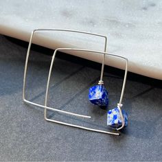 A Pair Of Handmade Square Or Diamond Sterling Silver Ear Threaders With Beautiful, Vivid Blue Lapis Lazuli Stones. Each Side Of The Diamond Shape Measures About 1.25 Inches, And The Lapis Stones Measure 8mm. Also Available In High Quality 12-14k Gold Fill With A Jeweler's Brass Core. Blue Wire Wrapped Hoop Earrings As Gift, Blue Wire Wrapped Hoop Earrings For Gift, Modern Blue Hoop Jewelry, Minimalist Blue Wire Wrapped Earrings, Blue Sterling Silver Wire Wrapped Hoop Earrings, Blue Nickel-free Hoop Earrings For Everyday, Blue Wire Wrapped Sterling Silver Hoop Earrings, Blue Handmade Minimalist Hoop Earrings, Handmade Minimalist Blue Hoop Earrings