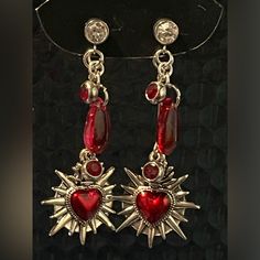 Add A Touch Of Elegance To Your Outfit With These Stunning Sacred Hearts Dangle Drop Earrings. Handmade With Care, They Feature Delicate Hearts That Dangle Gracefully With Blood Red Gem Accents. Perfect For Any Occasion, They Are Sure To Draw Compliments And Make A Lasting Impression. Gothic Heart Art, Red Jewelry Earrings, Hua Cheng Earring, Red Heart Accessories, Red Silver Jewelry, Red Drop Earrings, Gold Red Jewelry, Red Wedding Accents, Red Stone Jewellery