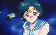 an anime character is staring at something in the distance with other characters nearby on a blue background