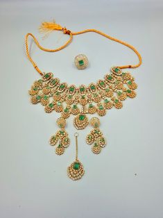 Premium quality Green Kundan Bridal Necklace Hand Set, Green Kundan Emerald Necklace For Wedding, Green Stone Work Necklace For Wedding, Green Stone Work Necklaces For Weddings, Green Kundan Temple Jewelry Set, Green Kundan Necklaces For Wedding, Traditional Green Hand Set Jewelry Sets, Traditional Hand Set Green Jewelry, Festive Green Jewelry With 17 Jewels