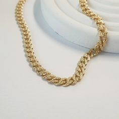 Elevate her style with our exquisite 7mm Miami Cuban Chain Necklace, crafted from luxurious 14K solid gold. Each piece is meticulously handcrafted, promising beauty and elegance that lasts a lifetime. Indulge in luxury with our Miami Cuban Chain Necklace, a symbol of strength and sophistication. The 7mm curb chain boasts a bold yet feminine design, perfect for making a statement wherever she goes. Whether it's a mama gift or a promise gift for your wife, this stunning piece is sure to captivate 14k Gold Chunky Chain Necklace Gift, 14k Gold Chunky Chain Necklace For Gifts, Elegant Cuban Link Chain Necklace As Gift, Elegant Cuban Link Chain Necklace Gift, Elegant Cuban Link Necklace As A Gift, Anniversary Cuban Link Necklace With Adjustable Chain, Anniversary Gold Plated Chain Necklace, Gift Jewelry With Chunky Cuban Link Chain, Cuban Link Necklace With Adjustable Chain For Gift