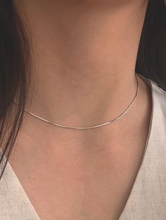 Editor's Notesbyweekend presents an essential snake chain necklace with silky smooth gloss. It is a simple yet, feminine item that stands out. - Snake chain- Silky smooth gloss- Made of silver 925- 18K gold plated- Sleek silhouette- Simple and basic style Measurements(in.)One Size- Size: 14.96 in. ( + 1.97 in. ) Composition & Care- Material: Silver 925, 18K Gold Plating- Plated products may discolor over time due to their nature.- Please be careful that discoloration may proceed faster in chemical substances, water, and heat.- As all jewelry products are vulnerable to discoloration, we recommend you gently wipe them with a dry cloth and store them in an airtight zipper bag when not wearing them Designer- by byweekend Daily Wear Neck Chain, Simple Chain Necklace Silver, Short Chain Necklace, Ring Chain Necklace, Stackable Necklaces Silver, Minimal Silver Necklace, Classic Herringbone Snake Chain Necklace, Silver Snake Chain Necklace With Delicate Chain For Everyday, Classic Silver Snake Chain Necklace For Everyday