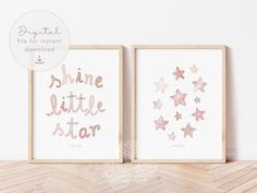 two framed prints with pink and gold stars on them, one is saying shine little star