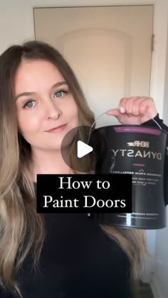 a woman holding up a paint can with the words how to paint doors on it