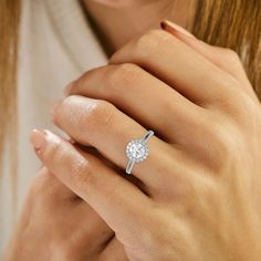 This ring features an round solitaire diamond elegantly secured in a four-prong setting on a solid gold band for a classic and timeless look. ✦ 𝐌𝐚𝐢𝐧 𝐒𝐭𝐨𝐧𝐞 𝐃𝐞𝐭𝐚𝐢𝐥𝐬✧ Shape: Round Cut Diamond✧ Focal Stone Size: 0.10 CT, 0.20 CT, 0.30 CT, 0.40 CT, 0.50 CT, 0.75 CT, 1.00 CT✧ Stone Type: Natural Diamond✧ Diamond Clarity: SI1 (0.10 CT - 0.49 CT), VS (0.50 CT - 1.00 CT)✧ Diamond Color: G-H✧ Diamond Certificate: Diamond Size of 1.00 Ct or higher will be IGI Certified. ✦ 𝐒𝐢𝐝𝐞 𝐒𝐭𝐨𝐧? Timeless Round Halo Diamond Ring, Timeless Round Single Diamond Wedding Ring, Formal Halo Ring With Brilliant Cut, Round Moissanite Halo Ring With Prong Setting, Timeless Halo Ring With Prong Setting, Diamond Halo Ring With Brilliant Cut, Moissanite Round Halo Ring, Timeless Round Diamond Ring, Diamond Solitaire Halo Ring