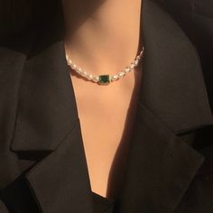 Handcrafted with care, this necklace features lustrous baroque pearls and vibrant emerald green gemstone, elegantly arranged to create a stunning contrast. The rich green hues of the emeralds complement the shimmering pearls, making this necklace a timeless and versatile accessory. Features: Handcrafted Elegant and versatile design Perfect for both casual and formal occasions Makes a thoughtful gift for someone special Specifications: Material: Emerald green zircon, cultured baroque pearls Lengt Pearl Emerald Necklace, Green Beaded Necklace With Pearl Drop For Gift, Green Pearl Drop Beaded Necklaces, Green Pearl Necklace With Pearl Charm, Green Beaded Necklace With Pearl Pendant, Green Pearl Necklace With Pearl Chain, Green Pearl Necklace With Pendant, Green Pearl Necklace With Pearl Pendant, Green Pearl Chain Necklace