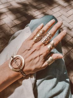 Mixing geometrics, aged brass and clear geodes is a passionate, natural pairing. The earth tones and crystals are set in a double circles setting one orbiting the other with a row of herkimer diamonds floating within. These gemstones are naturally faceted, raw & imperfect. So stunning, color is clear with flex. Topped off with a superior, thick aged brass chain. I specialize in contemporary bohemian jewelry made from natural elements. You are purchasing a single bracelet not a set - shown with c Adjustable Metal Bangle Jewelry, Unique Tarnish Resistant Metal Jewelry, Trendy Round Brass Jewelry, Bohemian Gold Bangle Jewelry, Gold Bangle For Accessorizing, Bohemian Gold-tone Metal Jewelry, Bohemian Brass Bracelet Jewelry, Gold Bangle Jewelry For Accessorizing, Bohemian Brass Bracelet