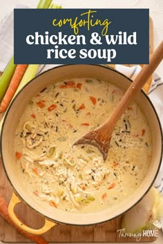 chicken and wild rice soup in a pot with carrots