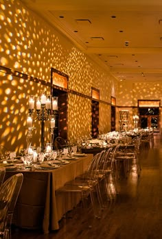 a long dining room with tables and chairs