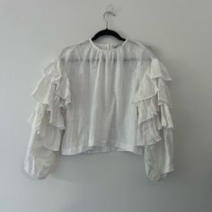 Rebecca Ruffle Top Olivaceous Msrp $48 100% Cotton In Color White Brunch Tops With Ruffle Hem And Ruffled Collar, Chic Ruffled Tops For Brunch, White Ruffled Tops For Fall, Chic Ruffled Tops For Daywear, Chic Ruffles Tops For Daywear, White Blouse With Ruffle Hem And Sleeves, Ruffled Collar Tops For Brunch, Brunch Tops With Ruffled Collar And Details, White Blouse With Ruffled Collar For Day Out