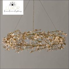 a chandelier with flowers hanging from it's sides and the words luxury lighting