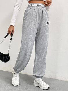 F00215614-103 Gray High Waist Sports Bottoms, Athleisure Gray Pants With Ribbed Waistband, Baggy Sports Bottoms With Pockets, Baggy High Waist Sweatpants For Sports, Baggy High Waist Sporty Sweatpants, Sporty Baggy High Waist Sweatpants, Athleisure Trousers For Gym, Relaxed Fit Full Length Sweatpants For Sports, Full Length Sportswear Sweatpants With Elastic Waistband