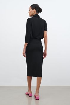 Black Minimalist Midi Skirt - Vesey Pencil Skirt | Marcella Modern Black Pencil Skirt For Evening, Classic Midi-length Evening Bottoms, Classic Midi Length Evening Bottoms, Modern Black Midi Pencil Skirt, Sleek Evening Midi Pencil Skirt, Sleek Midi Pencil Skirt For Night Out, Sleek Fitted Evening Pencil Skirt, Sleek Pencil Skirt For Night Out, Modern Lined Pencil Skirt For Evening