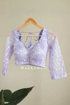 Beautiful hand embroidery work blouses in light pink and lilac. Very good finishing. It is worn or styled in any matching saree, lehenga etc.  Size Guide: UK       8       10    12    14 usa      4       8      10    12 Euro    34     36    38   40 Please Dm for any for more informations. Fitted Lavender Embroidered Sets, Embroidered Fitted Lavender Sets, Fitted Lavender Blouse Piece For Festive Occasion, Festive Fitted Lavender Blouse Piece, Fitted Lavender Traditional Wear With Resham Embroidery, Lavender Fitted Traditional Wear With Resham Embroidery, Anarkali Chikankari Embroidered Wedding Tops, Lavender Embroidered Lehenga For Wedding, Lavender Saree Set With Resham Embroidery