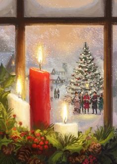 a red candle sitting in front of a window with christmas decorations on the windowsill