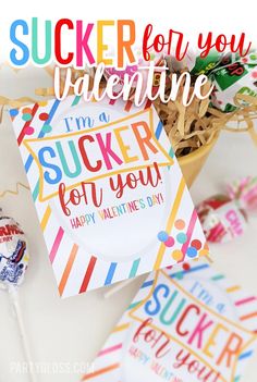 an image of a birthday card with candy and lollipops on the table