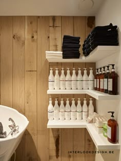 the bathroom is clean and ready to be used as a storage area for personal care items